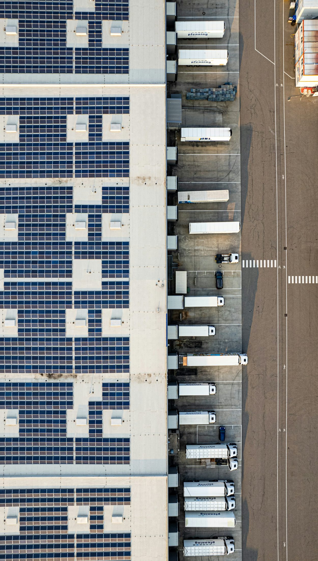 Aerial view of truck loading bays and a logistics yard